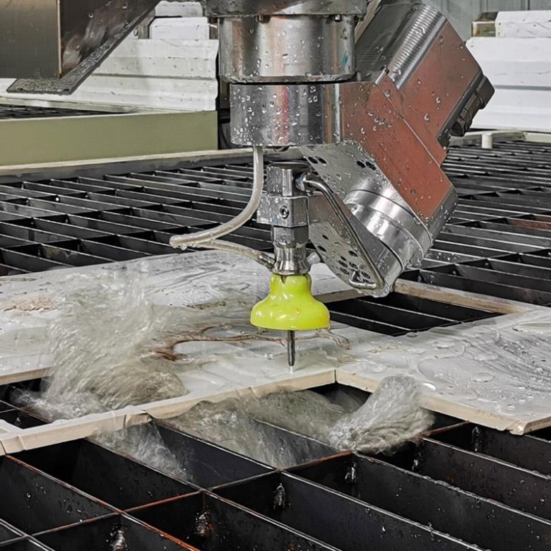 abrasive-waterjet-cutting-5-axis-nozzle-closeup-jaimac